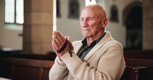 Rosary, prayer and senior man in church with faith, gratitude and spiritual respect in retirement