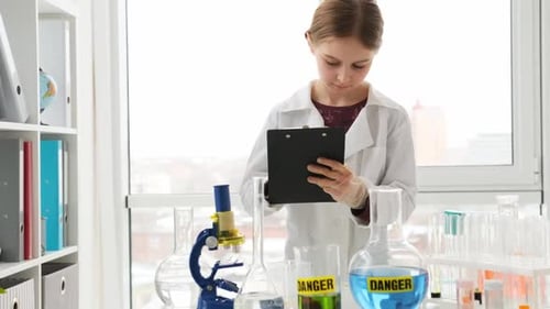 School Girl in Chemistry Class