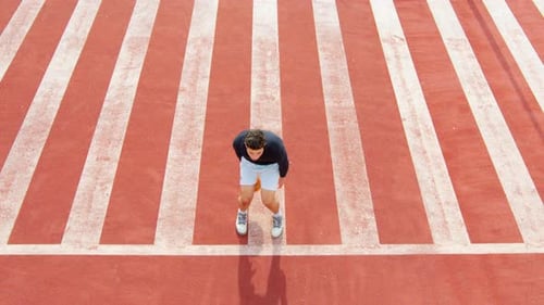 A Young Guy Practicing Basketball Dribbling on a Court