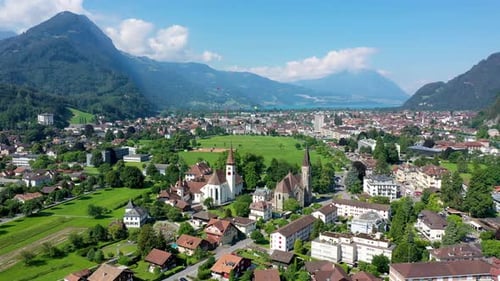 Aerial view over the city of Interlaken in Switzerland. Beautiful view of Interlaken town, Eiger, Mo