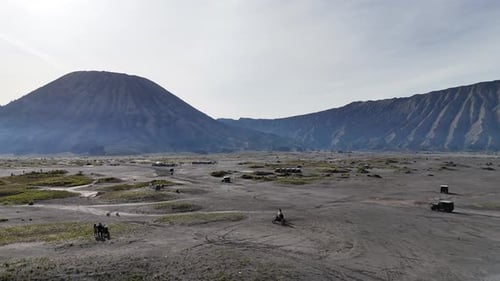 Motorcycles Traverse Mount Bromo's Expansive Volcanic Landscape