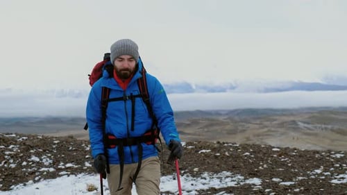 Portrait of Man Hiker Doing Hiking Outdoors Mountain Background Caucasian Male Walks with Sticks and