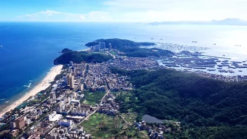Aerial Top view of a transparent blue sea with beautiful waves at sunny day in summer. air of ocean