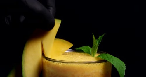 Refreshing Mango Smoothie with Mint Garnish