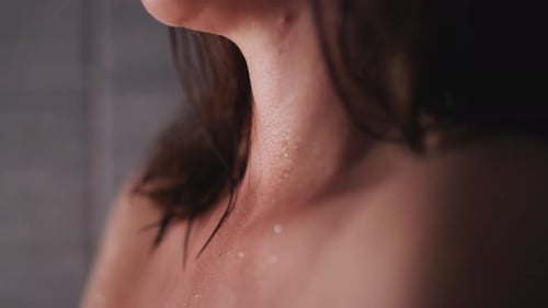 Woman Taking Shower, Close Up of Wet Skin