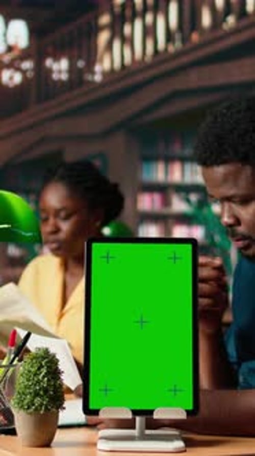Vertical Video Black College Students Reading Class Notes Next to Copy Space Screen