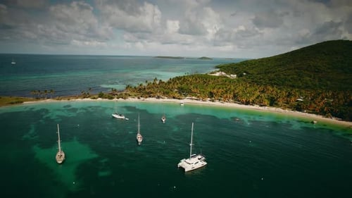 4k Drone Shot of Boats near an Island