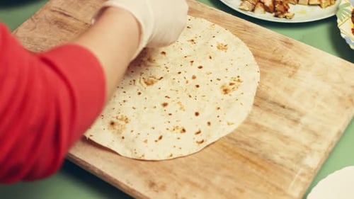 Contour Effect of Mexican Food Cooker Prepares Black Maize Tortillas with Cheese and Squash Blossom