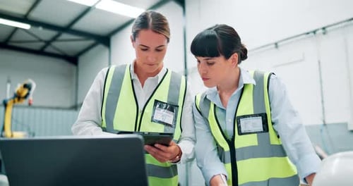 Tablet, computer and team of women engineers with research for maintenance