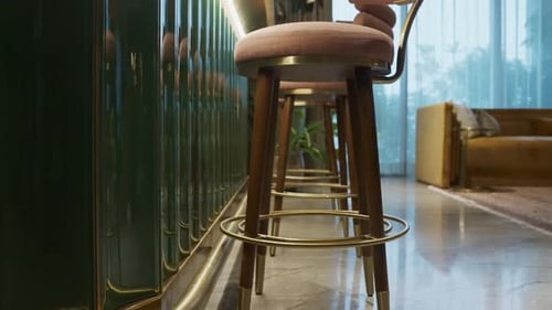 Modern Minimalist Bar Stools With Upholstered Round Shape, Tapered Lacquered Legs, and Brass Details