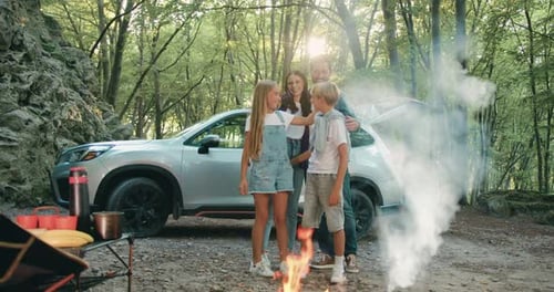 Happy Family Together Outdoors Near Forest