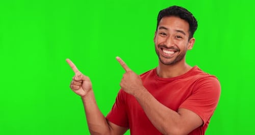 Man, pointing and presentation on green screen for marketing space, announcement or information