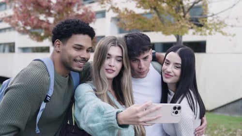 Diverse Students Taking a Selfie Together at the University Campus