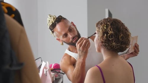 Brazilian Gay Man Applying Makeup for Woman Model in Studio
