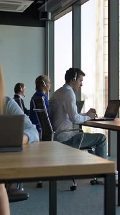 Vertical of Businesswoman Manage Callcenter Agency in Business Office