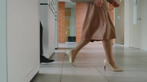 Office Workers Coming Off Elevator