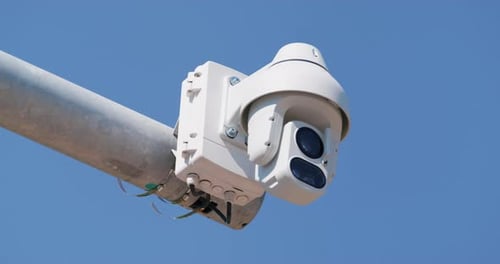 Street surveillance camera operates in park for safety