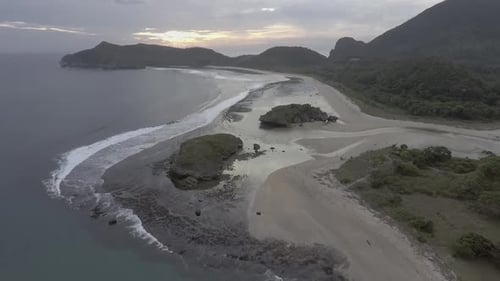 Aerial View of Coastal Beach and Rock Formations