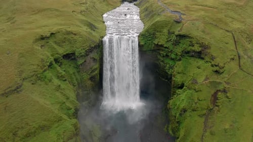 Aerial drone footage of Skogafoss waterfall in Iceland
