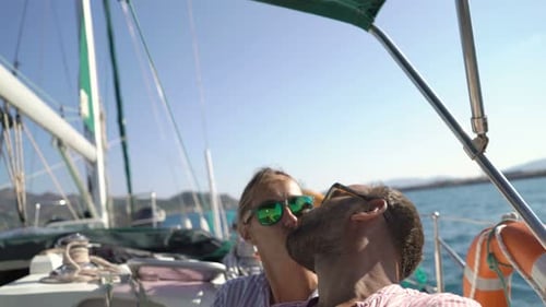 Happy Couple Taking Selfie Photos While Sailing Boat on Ocean Adventure