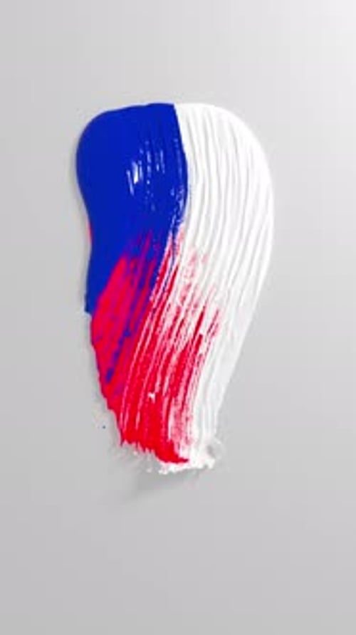 Glossy tricolor paint stroke on gray
