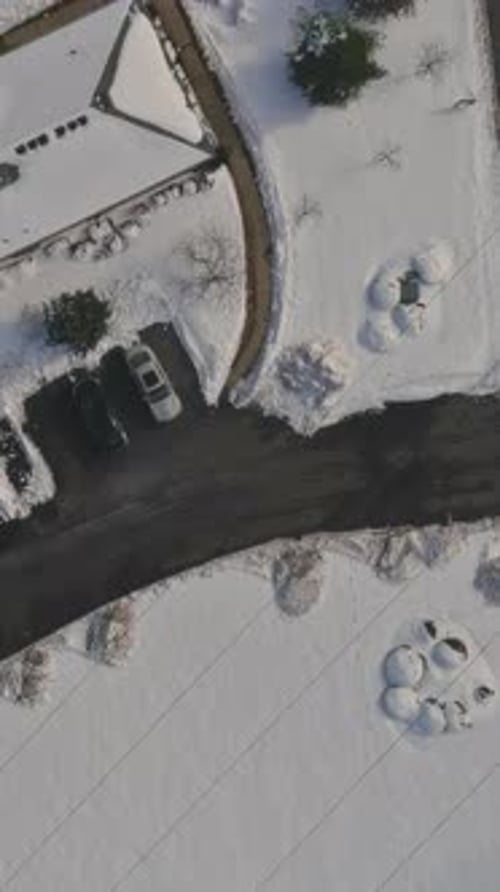Snow Covered Houses in Small American Town From Above Winter