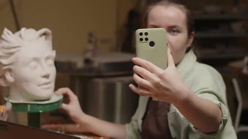 Sculptor on Video Call in Art Studio