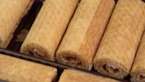 Delicious Golden Wafer Rolls Close Up Shot
