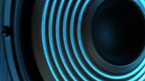 Moving Of Music Speaker Playing Music In Blue Light