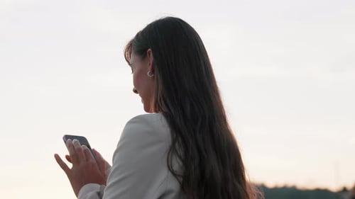 Close Up Attractive Young Woman Stand Use Phone Looking Around Smiling Camera Moving Around Girl