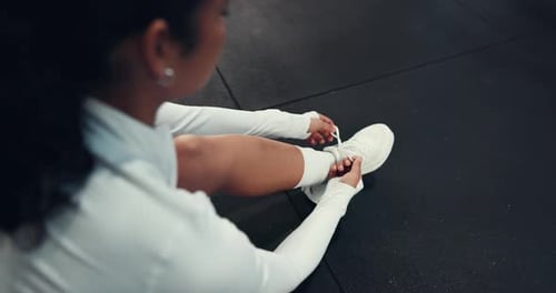 Above, shoes and laces in gym for fitness, run or start exercise routine with woman for health