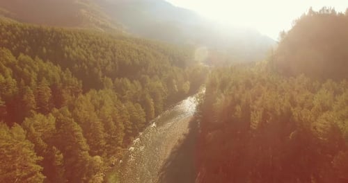 Low Altitude Flight Over Fresh Fast Mountain River with Rocks at Sunny Summer Morning