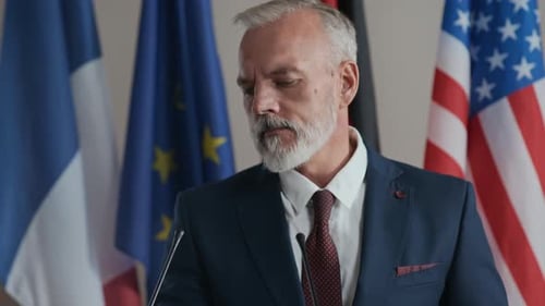 Businessman Giving Speech At Global Summit