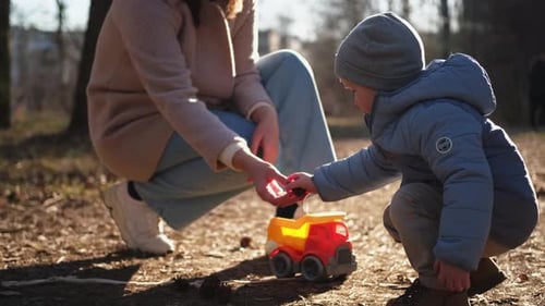 Happy Family Outdoor Mother Child on Walk in Park Mom Playing with Baby Son Outdoor Woman Little