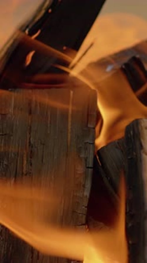 Vertical Wood Fire Bonfire at Night Close Up