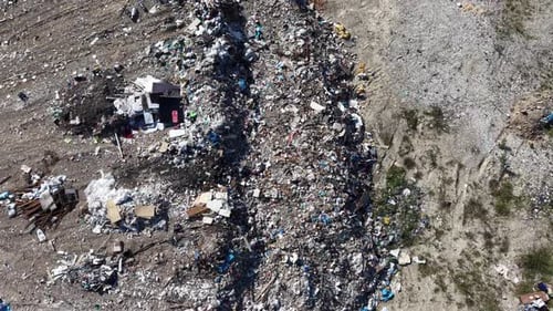 Aerial View of Landfill with Piles of Trash
