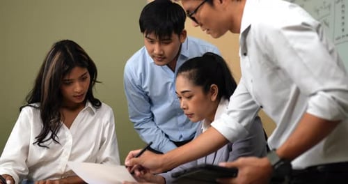 Young workers have brainstorm during business meeting in office
