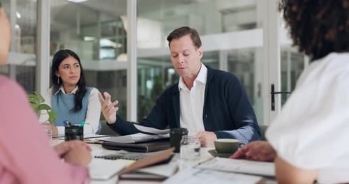 Teamwork, business people and man in office with documents, paperwork and meeting for feedback