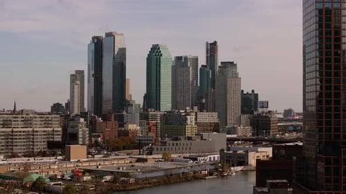 Camera Pans Over Queens Borough Revealing the Buildings and Skyscrapers of the Financial District of