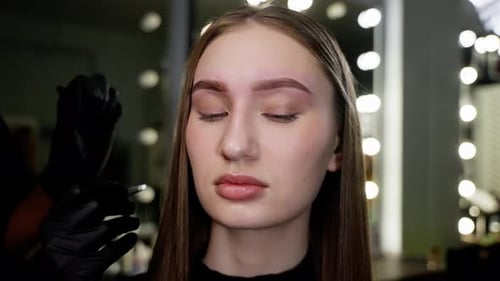 Eyebrow Tweezing Under Studio Lights