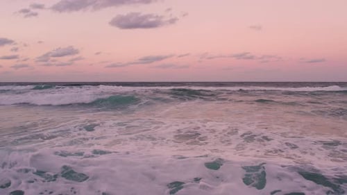 Great Seaside Sunset with Waves Crashing Slowmotion
