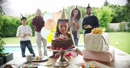 Girl Celebrates Birthday with Family and Friends