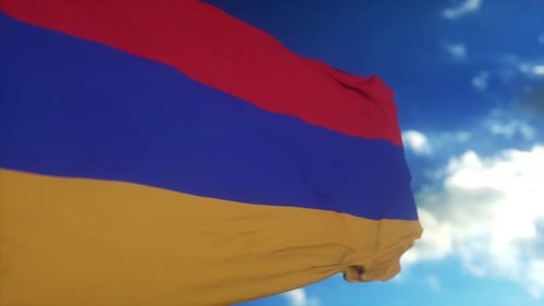 Realistic Armenian Flag Waving against Blue Sky