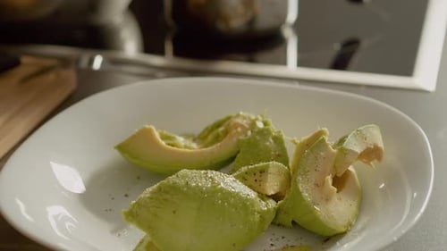 Fresh Avocado Slices with Olive Oil and Seasoning