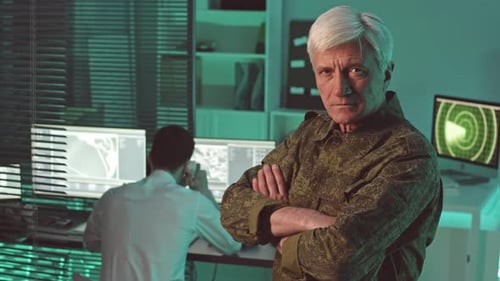Military Commander Overseeing Cybersecurity Operations at Night