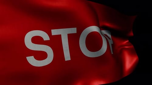 Fluttering Flag with the Word STOP Animated on a Transparent Alpha Channel