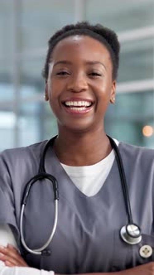Nurse, laugh and face of black woman in hospital with crossed arms for medical service