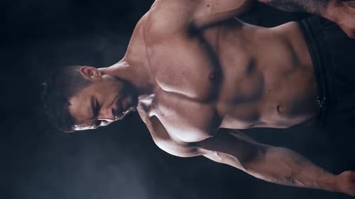 Fit and Sporty Bodybuilder Over Black Background Bodybuilder Training Using Barbell The Concept of