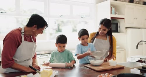 Family Baking Together in Bright Home Kitchen