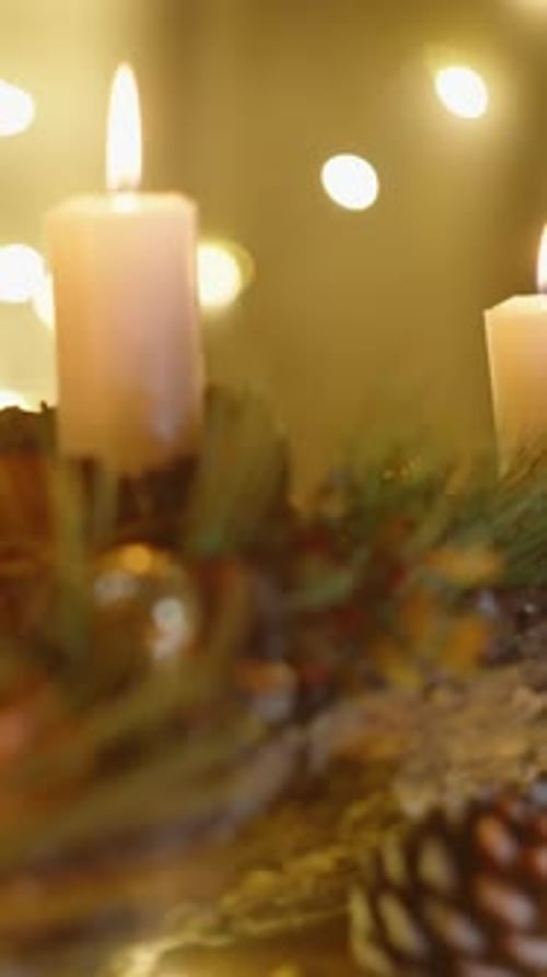 Vertical video. Handcrafted Christmas installation in a cozy home interior, featuring Christmas orna